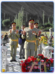 Major General Muzammil Hussain, Force Commander Northern Area (FCNA), offering fateha